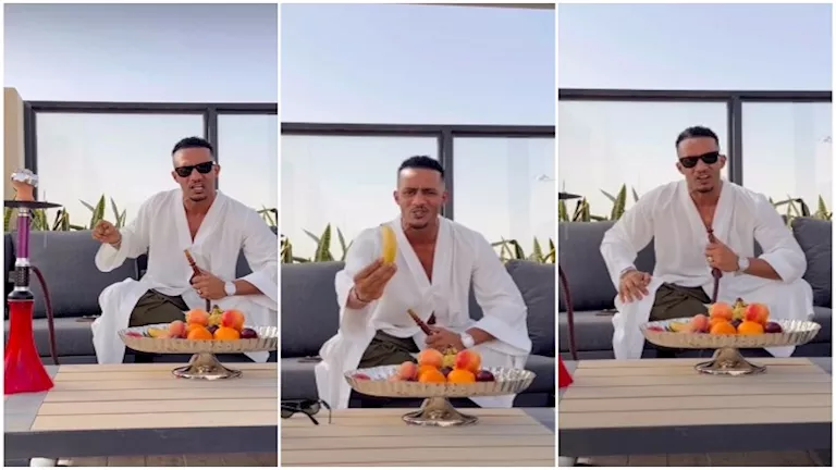 محمد رمضان بالشيشة والموزة: 5 لقطات تثير جدل الجمهور في "نمبر وان" 2 d985d8add985d8af d8b1d985d8b6d8a7d986 d8a8d8a7d984d8b4d98ad8b4d8a9 d988d8a7d984d985d988d8b2d8a9 5 d984d982d8b7d8a7d8aa d8aad8abd98ad8b1 1