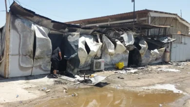 إخماد حريق في معرض سيارات بالعاصمة بغداد