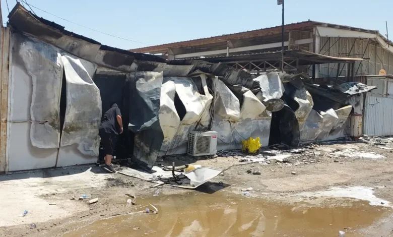 إخماد حريق في معرض سيارات بالعاصمة بغداد